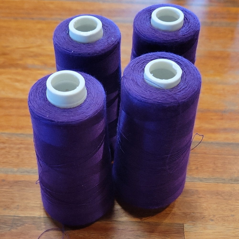 Set of Four Purple Sewing Threads